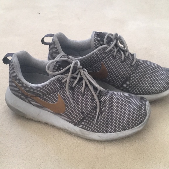 gray and gold nike shoes